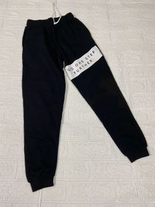 Black Joggers with "Go One Step Further" Graphic