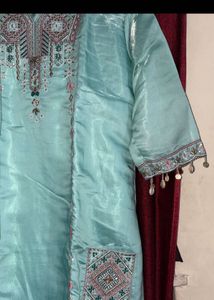 Elegant Teal Kurta Set with Intricate Embroidery