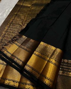 Elegant Black Saree with Gold Elephant Motif