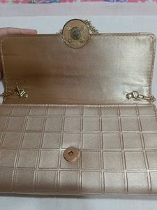 Mochi Gold Textured Clutch Bag
