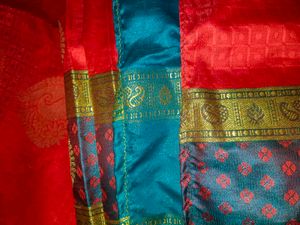 Vibrant Red Saree with Teal Border