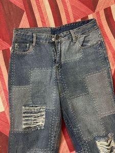Patchwork Distressed Denim Jeans