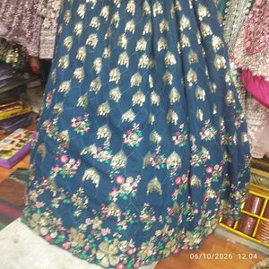 Rama lehenga with multi  emrodary