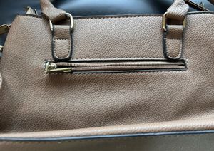 Stylish Taupe Handbag with Perforated Design