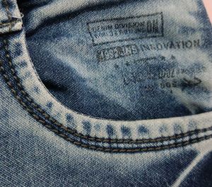 Distressed Blue Denim Jeans