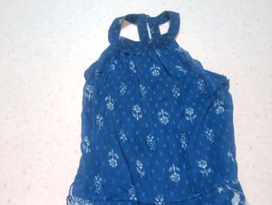 blue sleeveless halterneck jumpsuit
