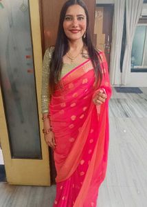 Vibrant Pink Saree with Golden mofies
