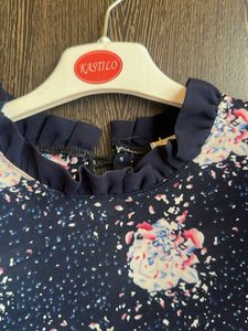 Navy Floral Sleeveless Top with Ruffle Collar