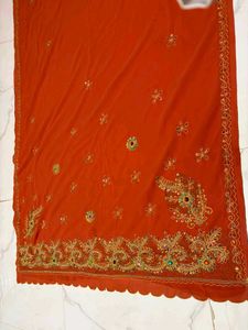 Embroidered rust Orange Saree