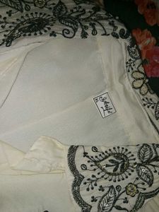 Cream Kurta with Intricate Embroidery