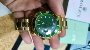 Luxury Gold &amp; Green Rolex Watch