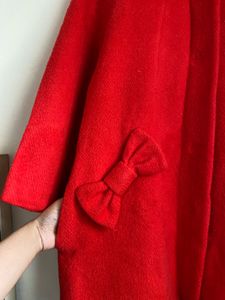 Charming Red Coat with Bow Details