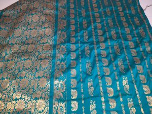 Teal Silk Saree with Gold Peacock Border