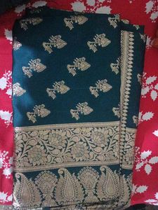 Elegant Teal Saree with Gold Brocade