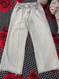 Light Wash Wide Leg Jeans with Distressed Detail