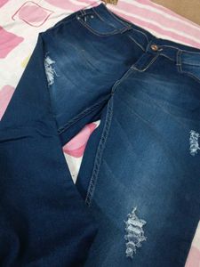 Ripped Blue Denim Jeans