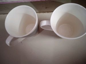 A PAIR OF MUGS WITH MOSAIC COLOUR EFFECT