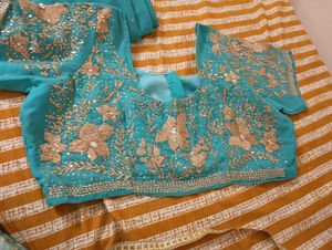 Turquoise Saree with Gold Embellishments