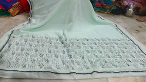 Elegant Mint Green Sequined Saree aari work
