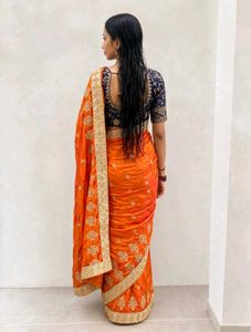 Elegant Orange Embroidered Silk Saree
