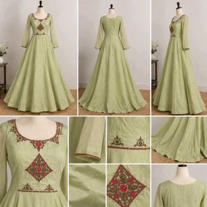 Elegant Pastel Green Embroidered Gown