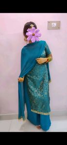 Boutique stiched firozi suit
