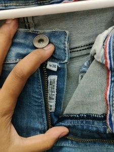 Light Blue Distressed Denim Jeans