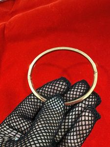 Gold Tone Designer Bangle Bracelet