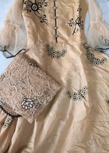 Elegant Beige Embroidered Gown