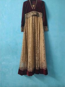 Elegant Maroon and Gold Gown