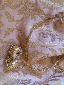 Golden Brocade Potli Bag with Tassel Drawstring –