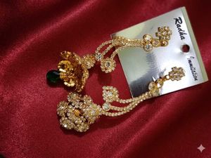 Elegant Gold Earrings with Green Stone