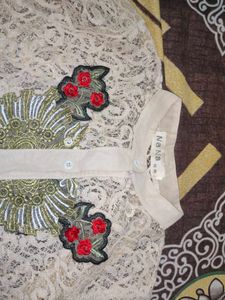 Elegant Lace Shirt with Floral Applique