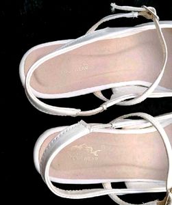 White Pointed Slingback Heels.
