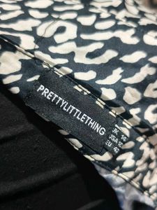 34209. Chic Animal Print Wrap Top