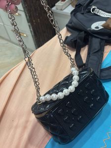 Chic Black Quilted Heart Vanity Bag