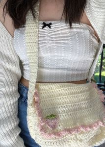 Handmade Crochet Bag with Floral Embellishments