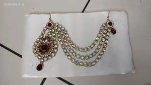 Exquisite Kundan Maang Tikka with Red Stone