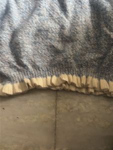 Cozy Knit Sweater with Ruffled Hem