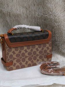 Stylish Coach Handbag Rust 🧡