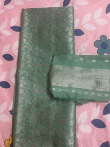 Elegant Mint Green Saree with Intricate Weave