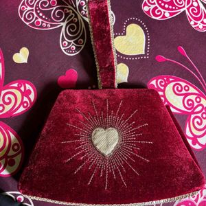 Charlotte tilbury Heart Clutch