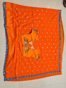 Vibrant Orange Saree with Blue Border
