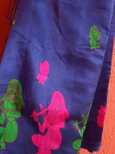 Blue Saree with Vibrant Figures