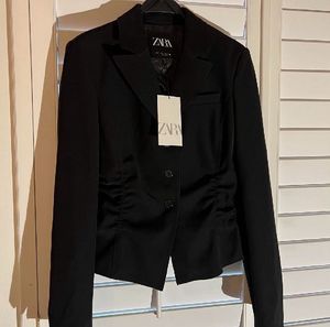 Zara gathered blazer with slit arm.