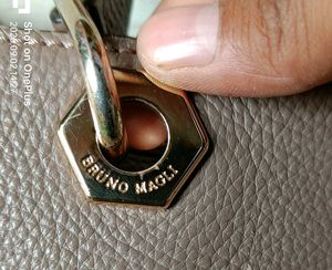 brand is bruno magli OG Stylish Taupe Faux Leather
