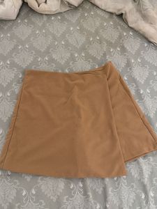 nude asymmetrical skorts with tags