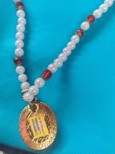 Beaded Necklace with Religious Pendant