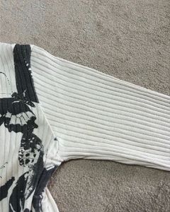 Cream Butterfly Print Ribbed Long Sleeve Top