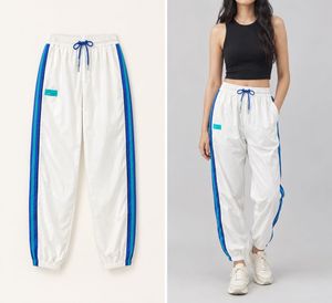 White Track Pants with Blue Stripes